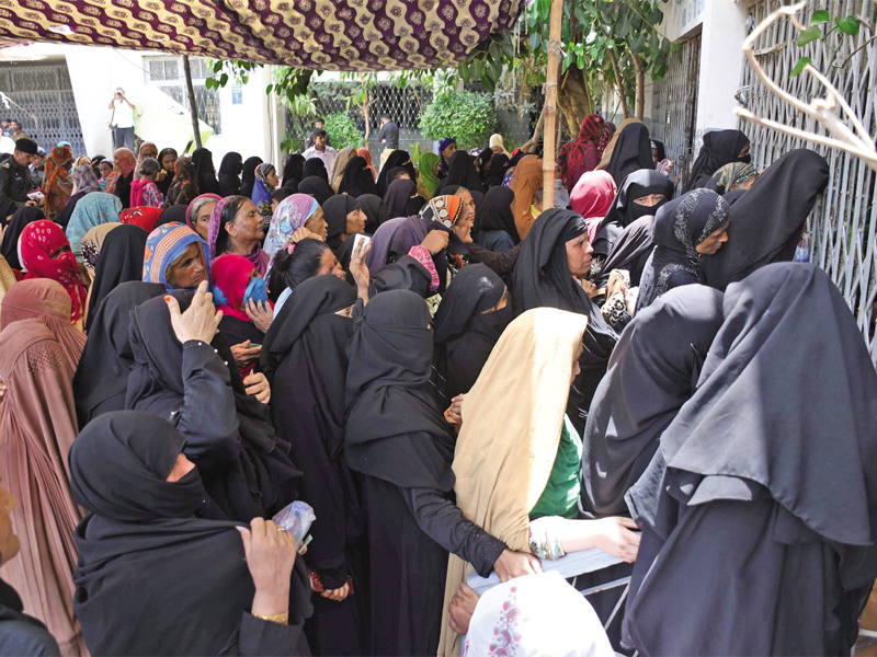 Woman dies, several faint in stampede during BISP cash distribution Woman dies, several faint in stampede during BISP cash distribution