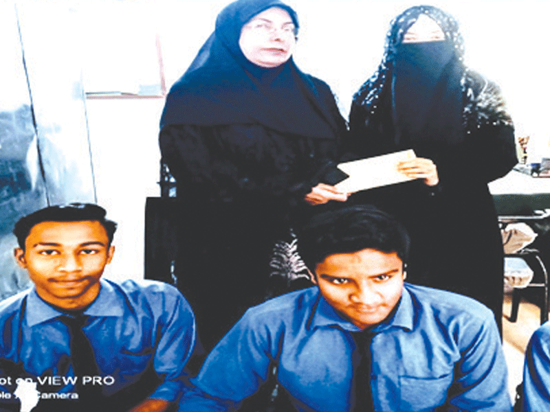 Students of Jinnah Varsity provide help to students of Al Falah Govt School