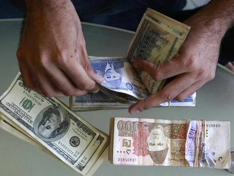 Rupee remains stable in value versus dollar Rupee remains stable in value versus dollar